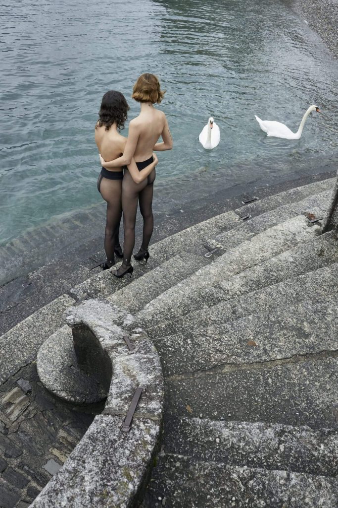 Two women & two swans, 
Saint Laurent Spring Summer 2019 campaign, Lake Como, Italy, 2018
Photography by JURGEN TELLER 